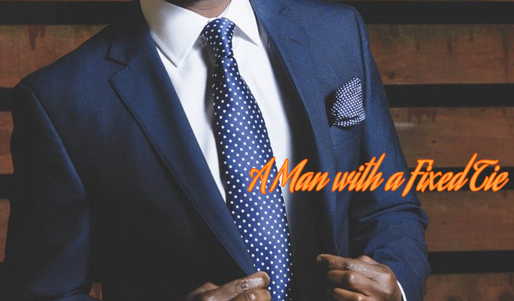 ネクタイが決まっている男性の画像です。