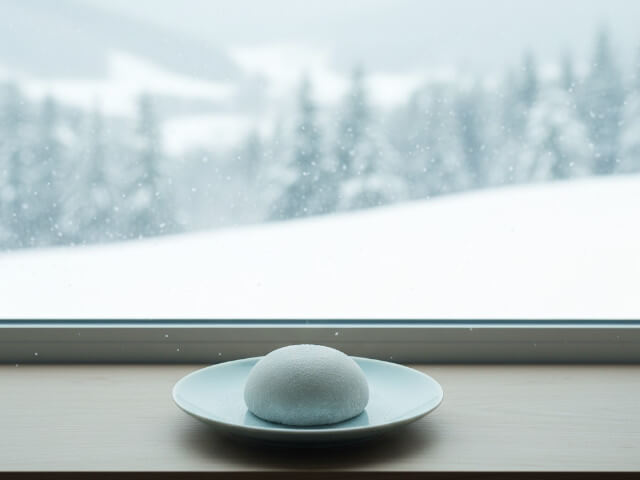 雪国の景色と白いお餅の画像です。